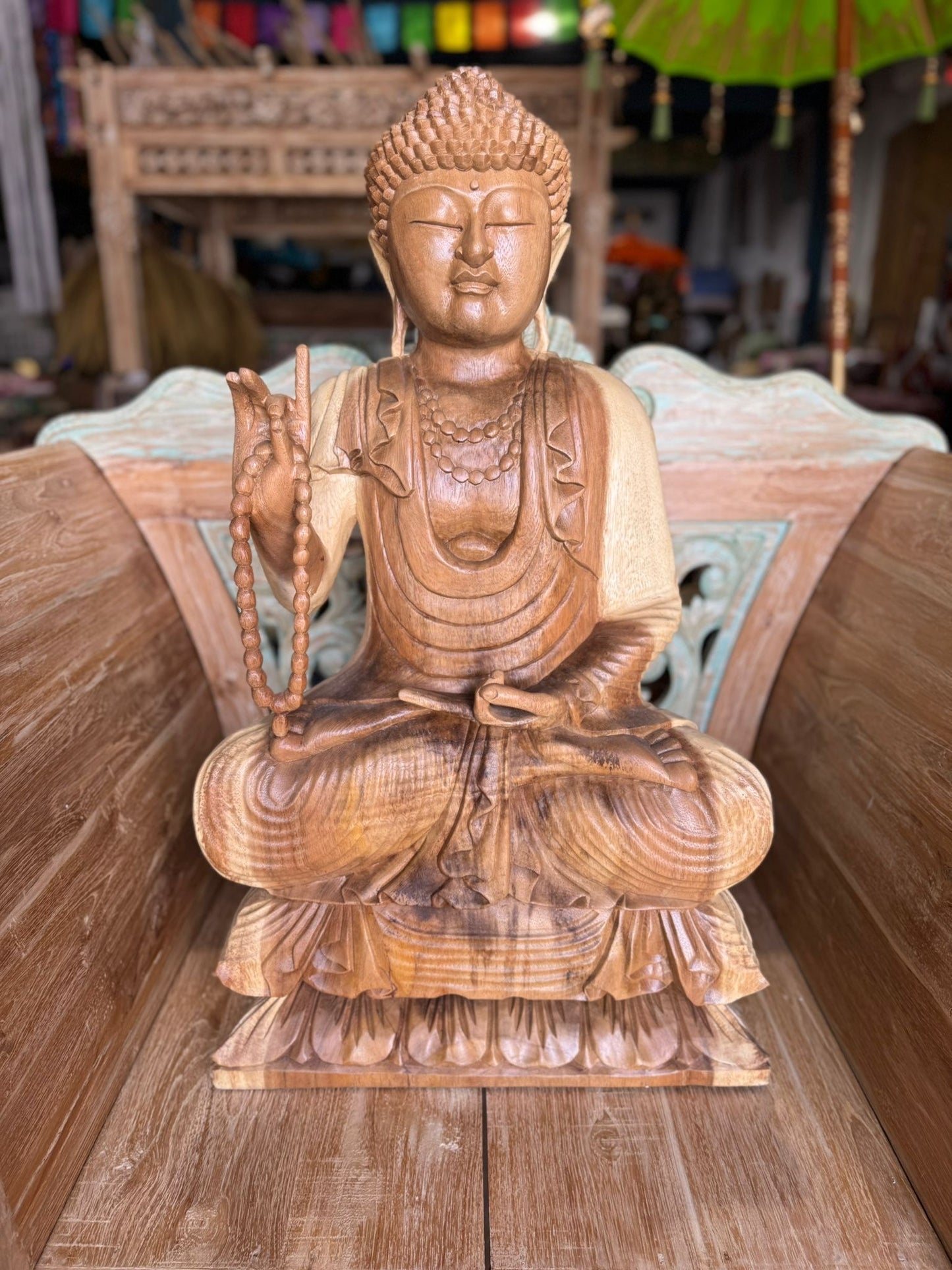 Buddha Wooden 85cm ht sitting on lotus. Preach and Teaching pose.