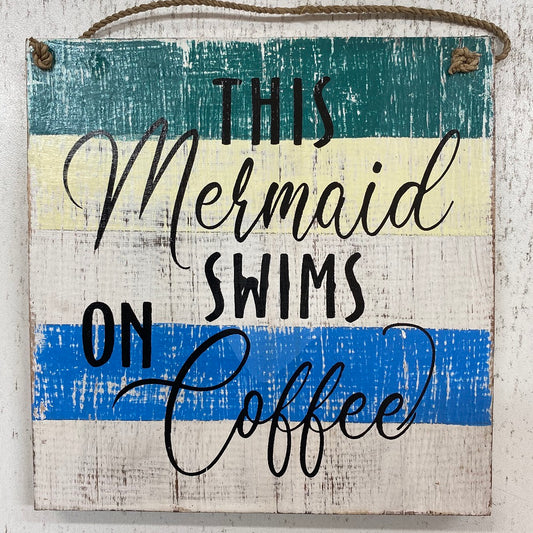 Timber panel this mermaid swims on coffee